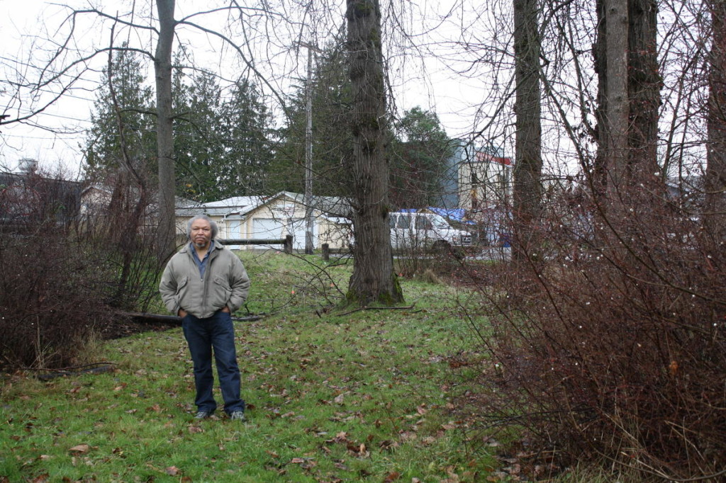 Willard Brown of the Delridge Neighborhoods Development Association wants this former substation to become a community garden. Behind the photographer, a fenced-in area with polluted ground will have to be cleaned up, Brown said.